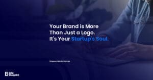 A startup founder's hands sketching a brand strategy mind map in a notebook, with words like 'Mission' and 'Audience' visible, symbolizing low-budget brand building.